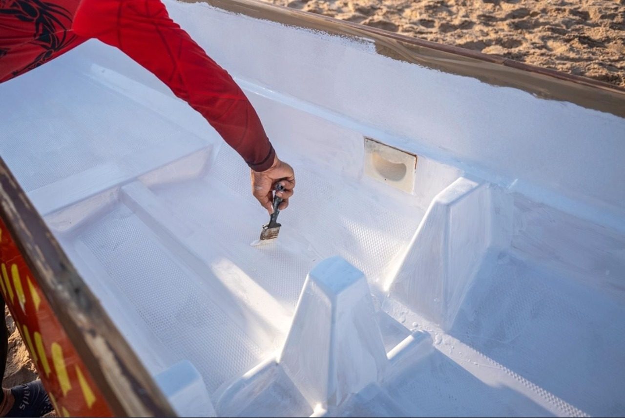 Aircraft Painting Sunshine Coast stock photo doha qatar march painting the interior of a dragon boat with white paint on a sandy 2697402853 e1779239200160