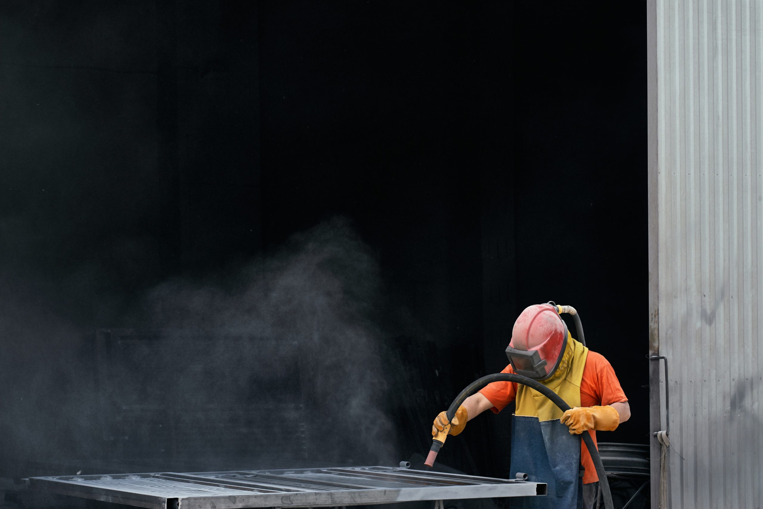 Vapor Blasting sandblaster smoothing metal in industrial workspac 2026 03 24 23 35 28 utc scaled